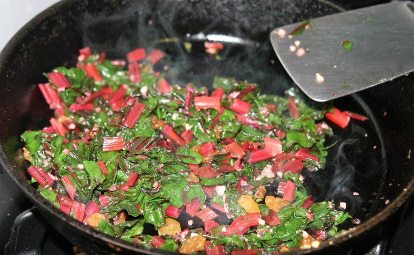 Sauteed Dark Leafy Greens with Pine Nuts., Garlic, and&nbsp;Raisins